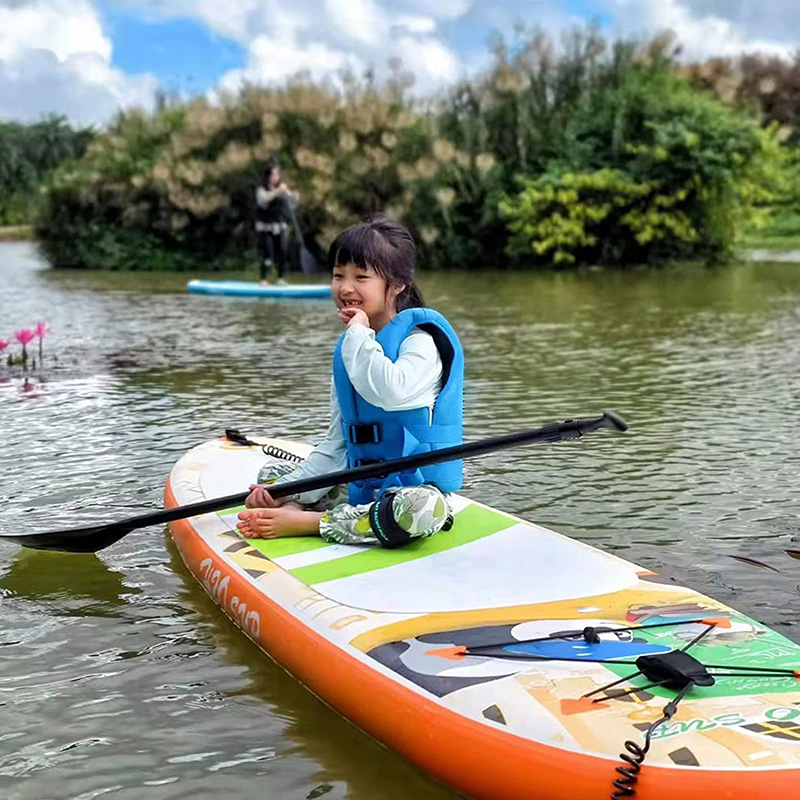 Tavola stand up paddle gonfiabile da 10 piedi per bambini che fanno surf